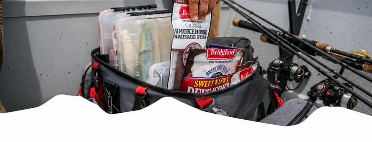 Bridgford sausage sticks and beef jerky packages inside a fishing bag