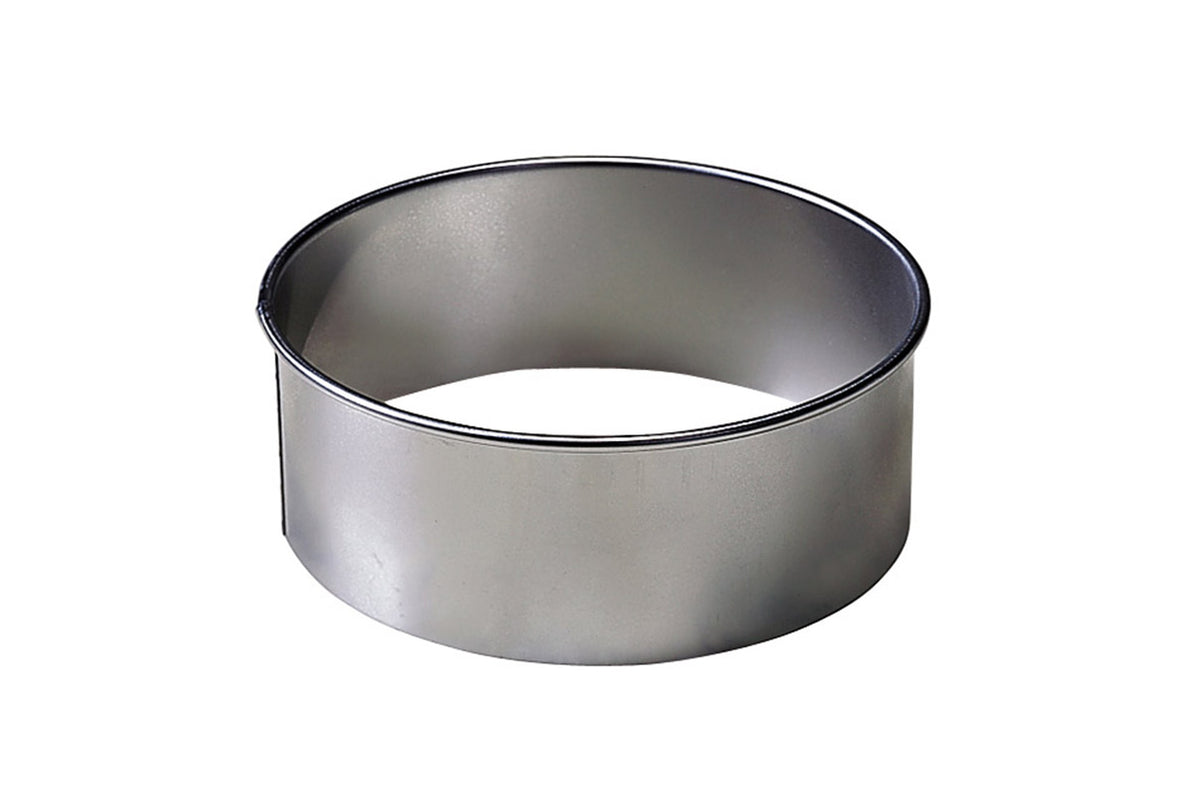 A circular stainless steel dough and biscuit cutter tool for shaping Bridgford biscuit dough.