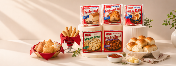 Assorted boxes of Pillsbury products including bread and rolls on a light background.