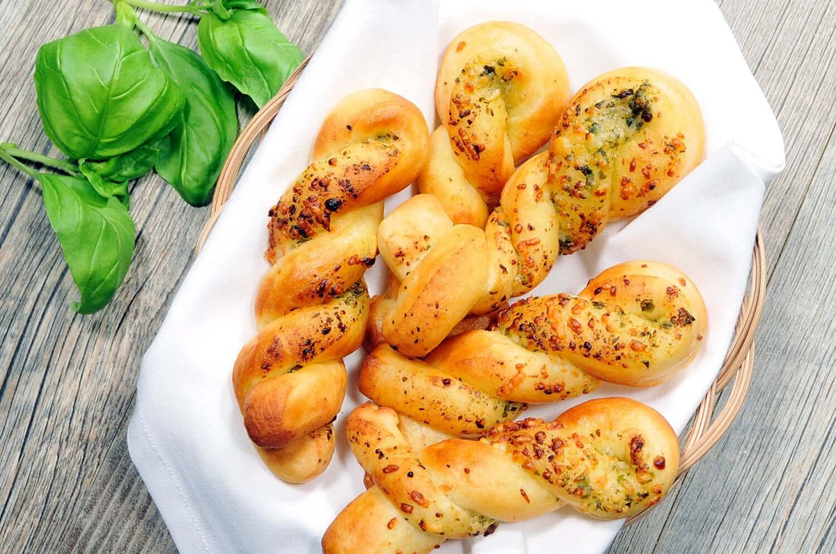 Pesto twist breadsticks on a plate