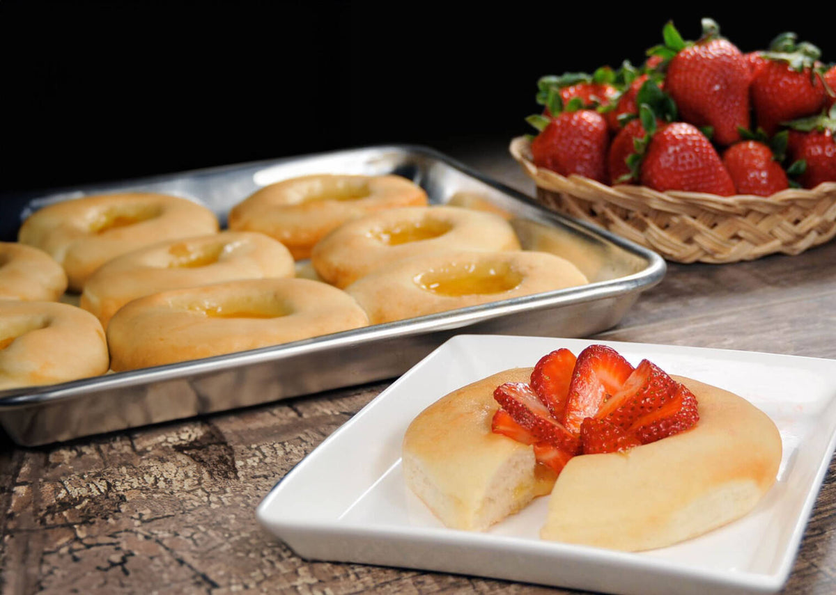 Bridgford kolaches filled with fruit and topped with fresh sliced strawberries